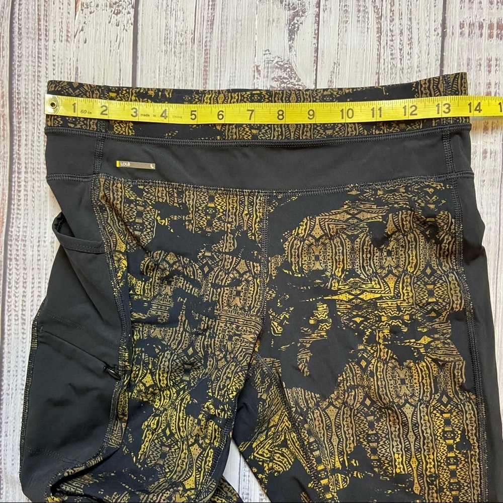 Lole Burst Black and Gold Print Ankle Leggings. Size Small. EUC - Picture 11 of 13